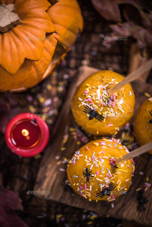Halloween sweet treat, apple candy Stock Photo by merc67 PhotoDune